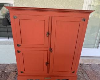 Coral colored storage cabinet