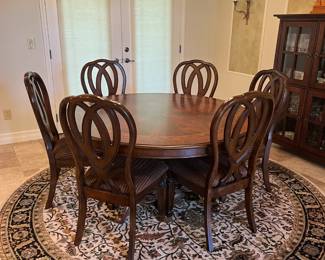 5' round x 29" dining table w braid inlay design, table pads 
6 Ashley side chairs, 19" to seat, 41" backs 