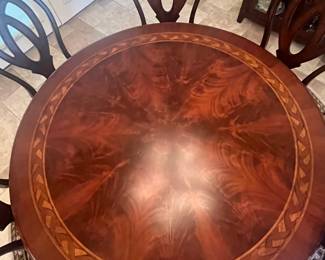 5' round x 29" dining table w braid inlay design, table pads 
6 Ashley side chairs, 19" to seat, 41" backs 