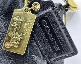 Coach Madison Phoebe Pebbled Leather Purse Bag Hobo With Gold Hardware & Purple Lining
Lot #: 7