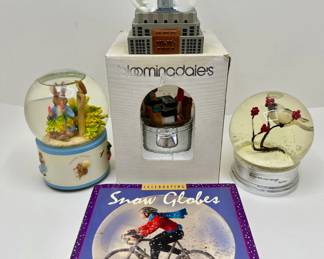 4 Snow Globes: New In Box Bloomingdales, Musical Peter Rabbit, M&Ms, Bird & Snow Globe Book
Lot #: 36