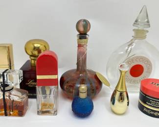 9 Vintage Perfume Bottles: Gurlain Shalimar, Jadore, Yves St Laurent, Ralph Lauren, Fidji & More
Lot #: 19