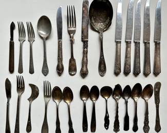 Over 25 Assorted Vintage Flatware Including Set Of Knives & Serving Utencils
Lot #: 98