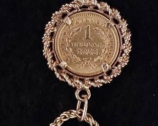 $1 Dollar Liberty Head 1853 Gold Coin mounted in bezel w/ 14K rope chain.