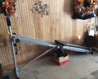 Total Gym with headrest and foot bars to attach