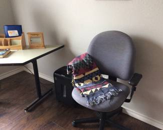 Fellows Shredder next to office chair