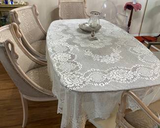 Glass top table with two swan base