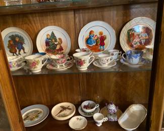 Decorative plates and tea cups w/ saucers