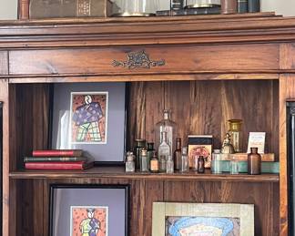 Fabulous book case filled with antique collectibles and books