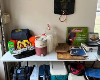 Coolers, camp shower, water storage, sleeping bags