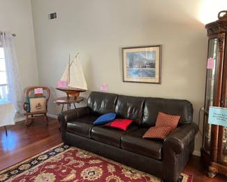 Leather Couch
Persian rug