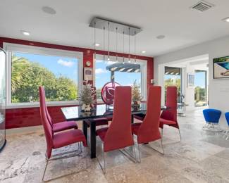 Roche Dining Room table and 10 red chairs - Black glass top extension table - measures 79-116" L x 29.5" H x 42" W