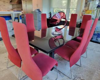 Roche Dining Room table and 10 red chairs - Black glass top extension table - measures 79-116" L x 29.5" H x 42" W