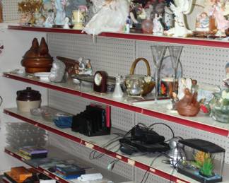 DVDs, CDs, collectible angels and glass