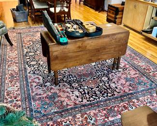 Drop leaf Table sold - $75; Rug $1500