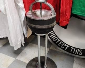 Vintage Cigarette Ash Tray and has actual cigarette butts still in the container. 