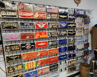 Large Assortment of Military Related License Plate Signs