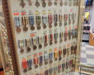 Large Assortment of Military Medals in Display Case
