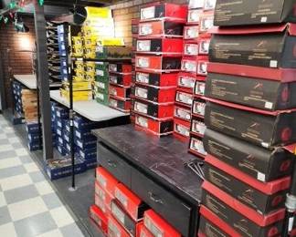 Assortment of New Shoes in Boxes