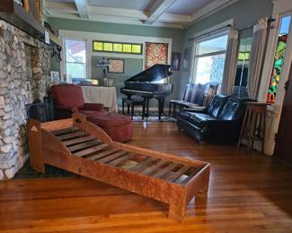 Limbert daybed in the forefront is sold.