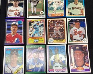 BOX OF ASSORTED 1970s-2000s BASEBALL CARDS, NOLAN RYAN TOM SEAVER, WILL CLARK, DAVE STEWART, JOHN SMOLTZ
TOM GLAVINE, GEORGE BRETT, CURT SCHILLING
RANDY JOHNSON, KIRK GIBSON, MIKE MUSSINA
1969 JAMES HOYT WILHELM CARD 300+ CARDS,