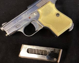 EIG TITAN .25cal AUTOMATIC PISTOL w MAG & ORIG. BOX