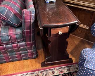 Expands drop leaves with drawer 