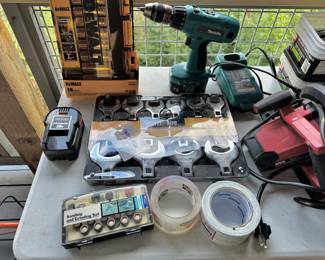 Makita Cordless Driver Drill - 6337D,  Makita 7.2V - 18V Universal Battery Charger - DC1804, Ridgid Drill Replacement 18V 1.5Ah Lithium-Ion Battery - R86006, Hurricane Jumbo Crowfoot wrench Set, Dewalt 10 Piece Metric 1/2" Drive Chrome Vanadium Steel Deep Socket Set, Craftsman 38 Piece Sanding and Grinding Set, SKIL Circular Saw - 5180-01