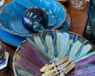 Blue Blown Glass Ornament, Purple/Blue/Black Pottery Serving Bowl, Blue/Brown Pottery Serving Bowl, Spoons and Platter