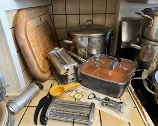 Pasta Maker, Wooden Carving Board, Assortment of Pots and Pans