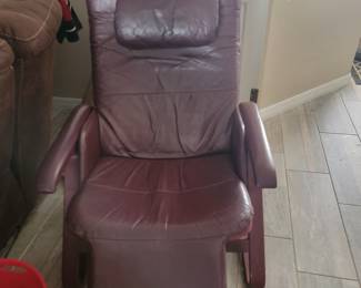 Burgundy colored distresses chair one of the knobs is loose