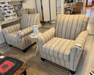 Matched pair of these contemporary club chairs