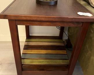 We have a pair of these end tables with "re-claimed wood" look shelf