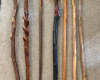 Lot of 7 walking sticks. --- $65
