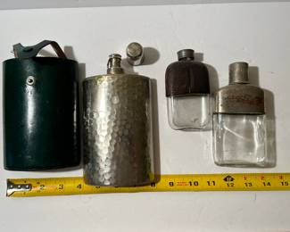 Lot of 3 vintage flasks.  Left is marked Germany. No markings found on other 2.  — $50
