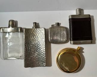 Lot of 5 vintage flasks. Four are marked “Germany.”  Gold tone one has no markings.  —-$75
