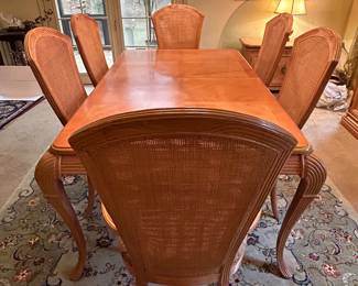 Bernhardt Dining Table & 8 Cane back Chairs, 6 side chairs and 2 end/captain chairs.. Table measures 108L 42W 28.5H. (72L, plus 2 18” leaves to 108L). Excellent condition. --- $450