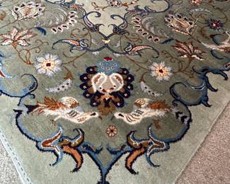 Handmade Rug measures 11.3 x 77. Pet free/smoke free home.  Fringe on edges have been taped down and/or missing. A few spots to be cleaned, as photographed. --- $380