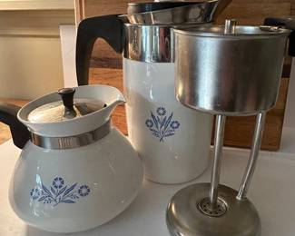 5 Pc Lot - Corning Blue Cornflower.  6 cup tea (see photo for inner wear), 8 cup coffee w/all inner parts, 2 qt bread, 1.5 quart covered and 2 or 3 (?) quart covered.  All in excellent condition with the exception of teapot inner as shown.  —- $75