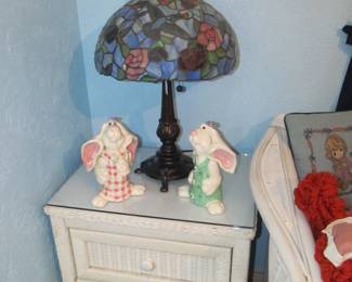 Great vintage wicker/rattan furniture collection. Nice collection of vintage dolls and plush animals. Beautiful Tiffany style stained glass lamp.