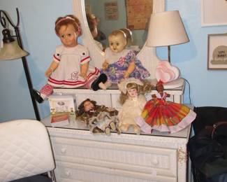 Great vintage wicker/rattan furniture collection. Nice collection of vintage dolls and plush animals.