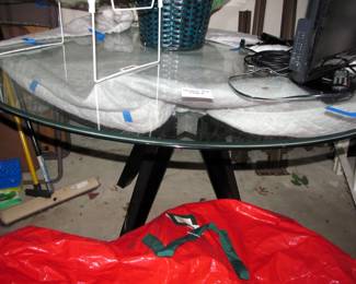 An incredible indoor contemporary glass-top table
