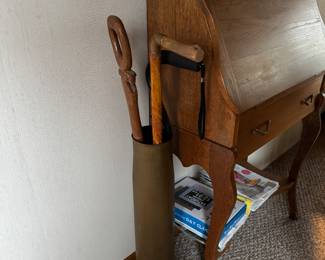 Antique mortar shell umbrella stand