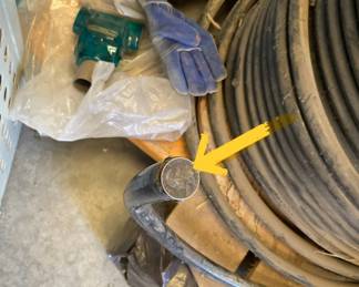 Picture 2 of electrical cable, roll of electrical cable for under ground service entrance, about the diameter of a quarter
