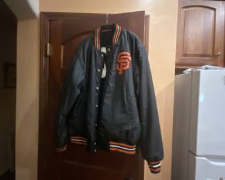 Picture 3 shows the jacket turned inside out to transform it into a wind breaker, embroidered SF logo on both sides. This one is a beauty