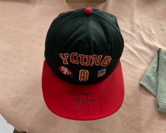 Signed  Young NFL cap 