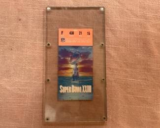 Super Bowl XXIII Ticket Stub, This 1989 game was a return match up with the Cincinnati Bengals and S.F. 49’rs.  They had previously met in Super Bowl XVI in 1982.                                                                                                     Super Bowl XXIII fourth quarter 49’r drive and come from behind win goes down in history as one of the most in the clutch drives by Joe Montana and the 49’rs