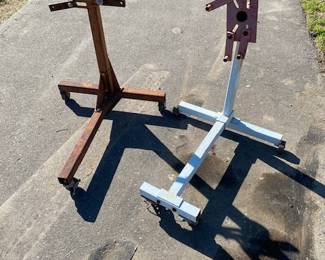 Two engine stands, one has steel castors