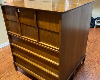 there are two of these beautiful mid century dressers, back to back in the master closet , priced separately 