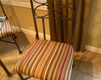 glass top square set with four chairs, metal frame scroll look 